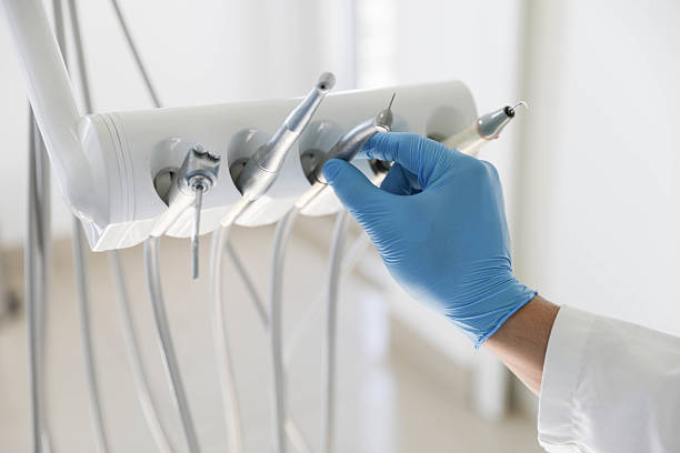 Professional Tooth Extraction technician working in Mulvane, KS